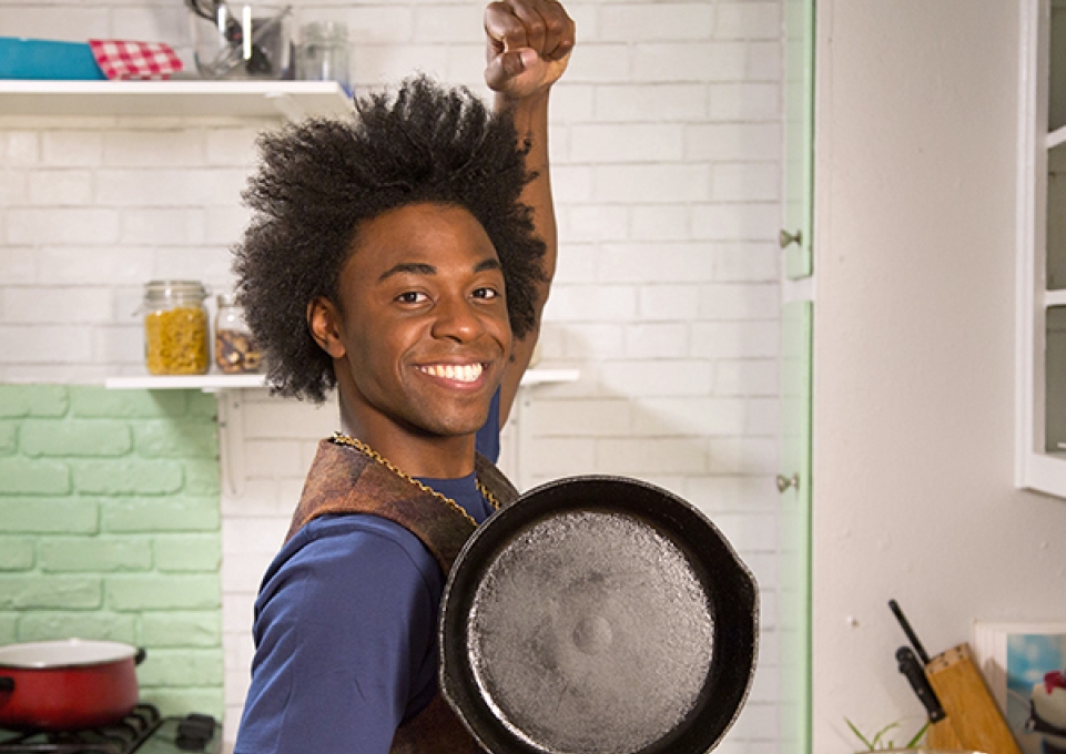 Lazarus Lynch with a cast iron skillet